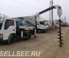 Аренда ямобура Isuzu ELF услуги по бурению БКМ - 2
