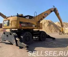 Перевалочник CAT 325, 2013 г. из Европы - 2