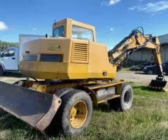 Колесник Liebherr 310, 12 т, доп. линии, 2 ковша - 2