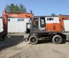 Колесник Hitachi 190, 2009 г, 20 т, 2 ковша, доп. линии